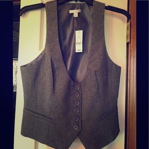 Fitted ladies vest with adjustable waist strap